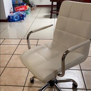 COPY - It’s a white chair with wheels